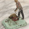 Lot 049 - Antique German Tin Occupational Toy, Man Working At Grinding Wheel, Note Paint Losses, Other Wear, 4-5/8" H