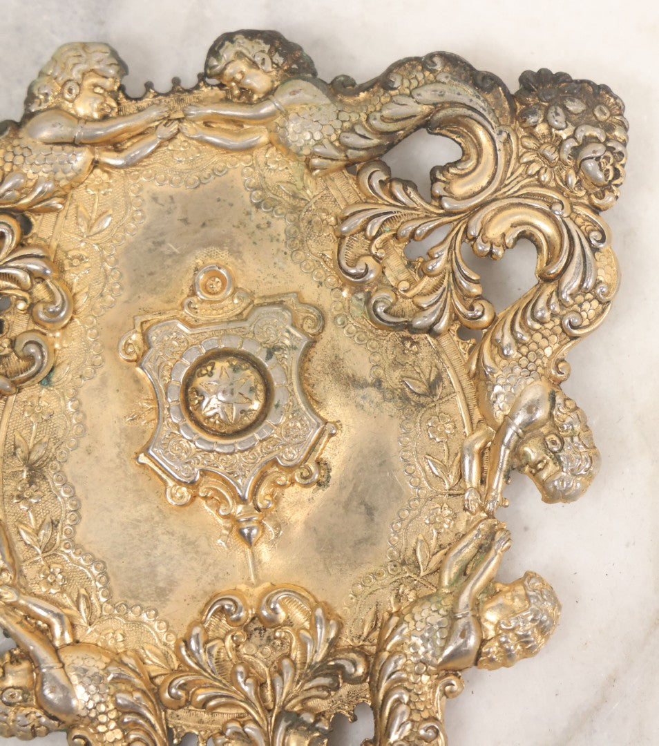 Lot 052 - Antique Ornate Gilt Brass Fragment With Mermen, Cherubs, And Foliate Scrollwork