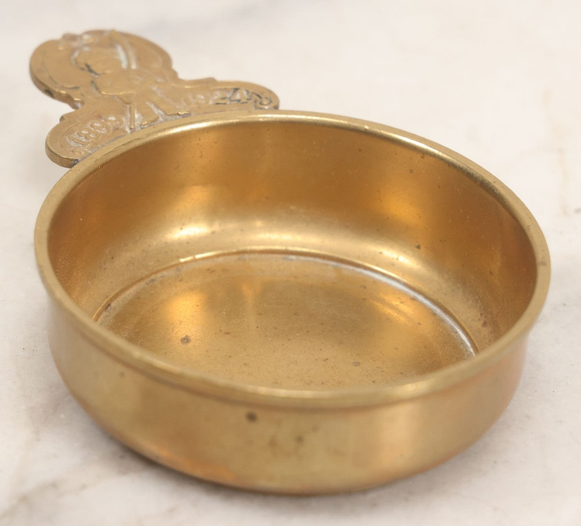 Lot 053 - Antique Brass Tastevin Wine Up With Soldier Figure, Commemorating 25th Anniversary Of Something, 1899-1924