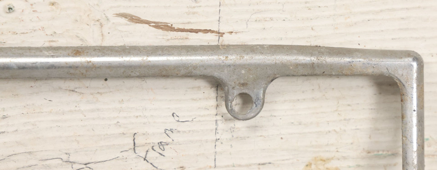 Lot 055 - Vintage "Keep On Truckin'" Metal License Plate Frame Topper