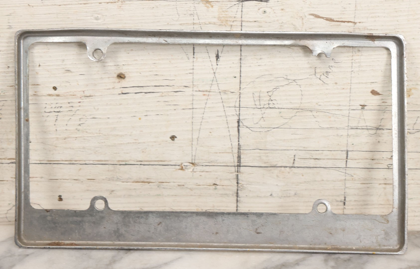 Lot 055 - Vintage "Keep On Truckin'" Metal License Plate Frame Topper