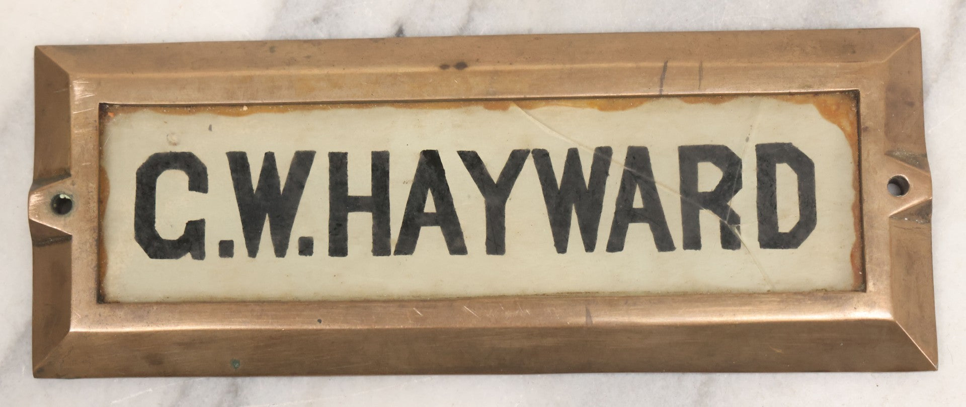Lot 062 - Vintage Reverse Painted Name Plate Door Tag For G.W. Hayward In Brass Mounting Frame, Not Cracked