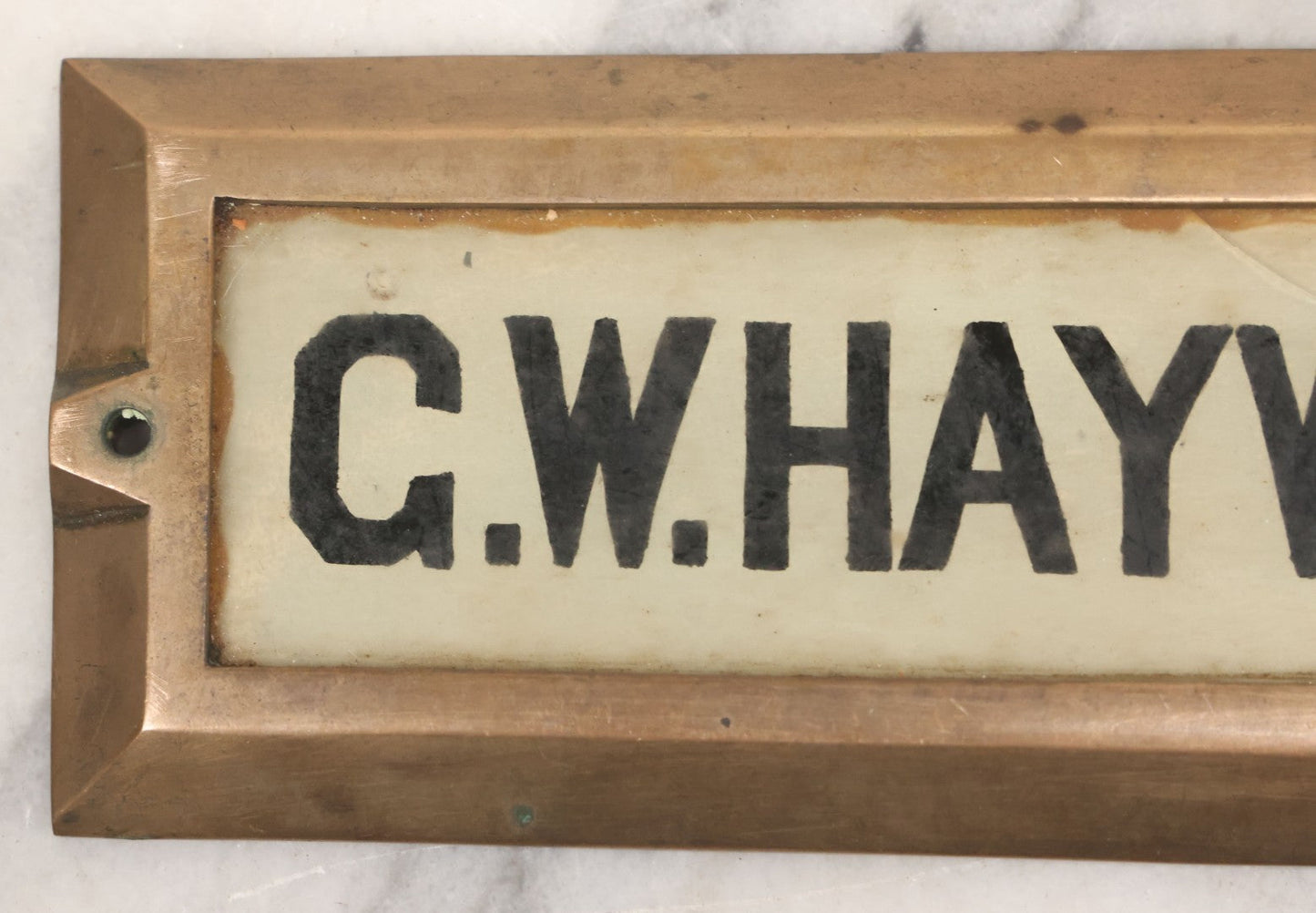 Lot 062 - Vintage Reverse Painted Name Plate Door Tag For G.W. Hayward In Brass Mounting Frame, Not Cracked