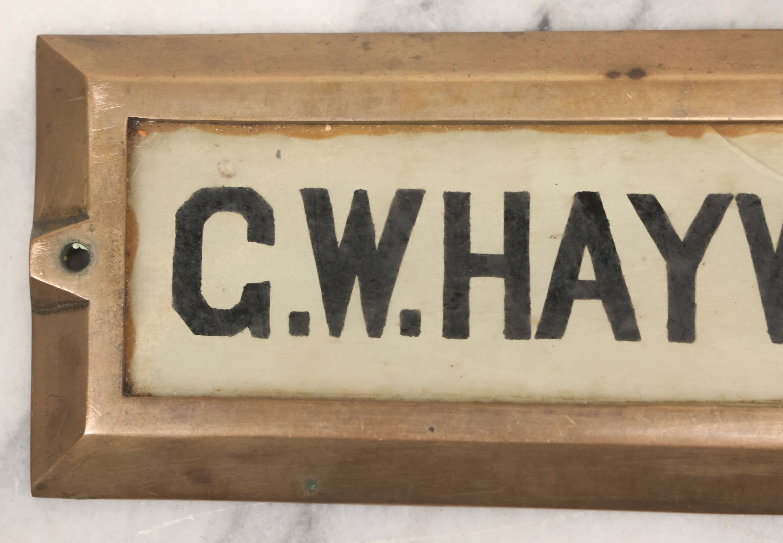Lot 062 - Vintage Reverse Painted Name Plate Door Tag For G.W. Hayward In Brass Mounting Frame, Not Cracked