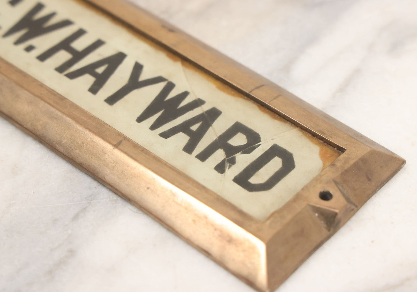 Lot 062 - Vintage Reverse Painted Name Plate Door Tag For G.W. Hayward In Brass Mounting Frame, Not Cracked