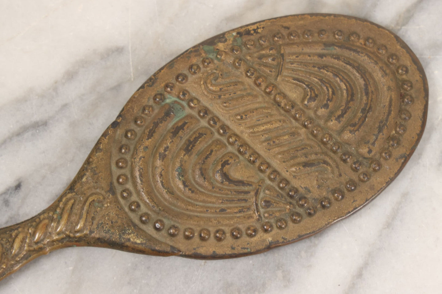 Lot 063 - Antique Pressed Brass Repousse Hand Mirror