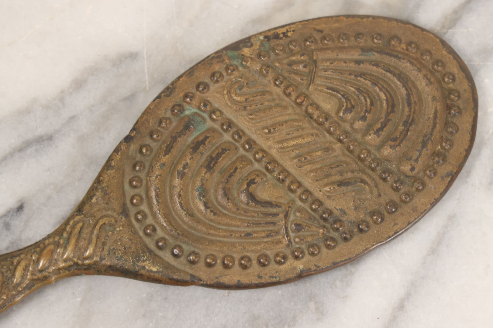 Lot 063 - Antique Pressed Brass Repousse Hand Mirror