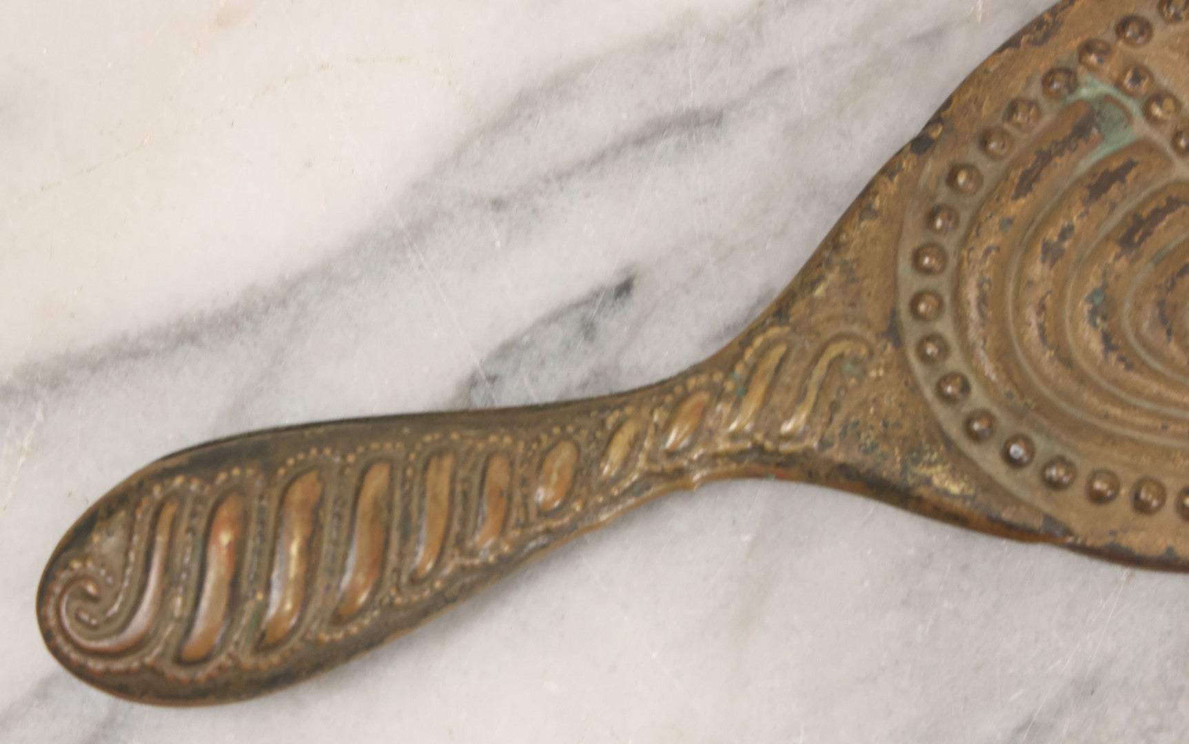 Lot 063 - Antique Pressed Brass Repousse Hand Mirror