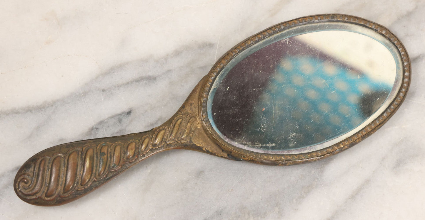 Lot 063 - Antique Pressed Brass Repousse Hand Mirror