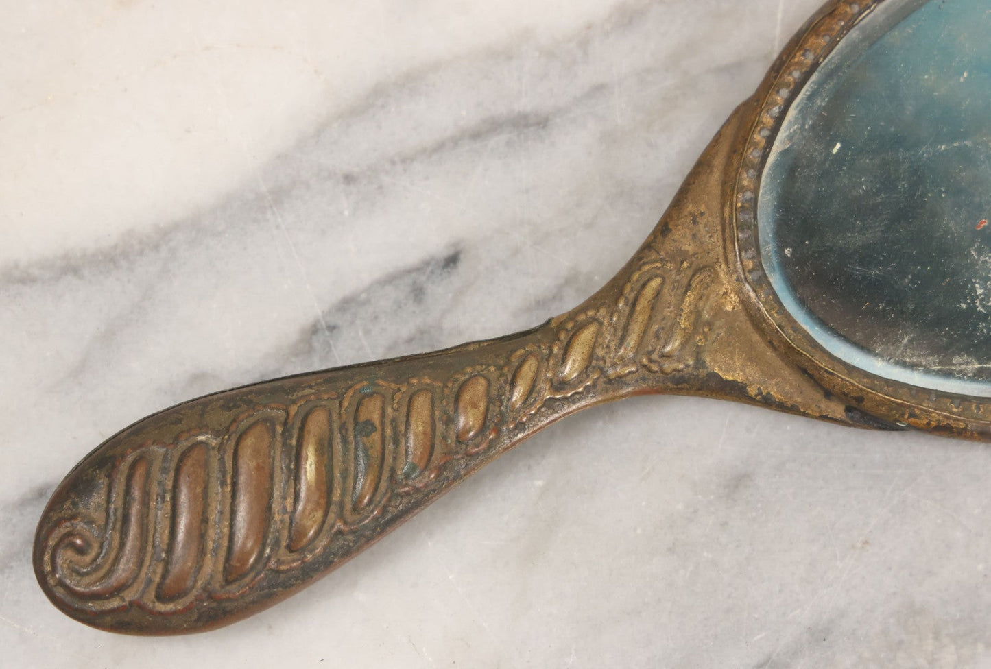 Lot 063 - Antique Pressed Brass Repousse Hand Mirror