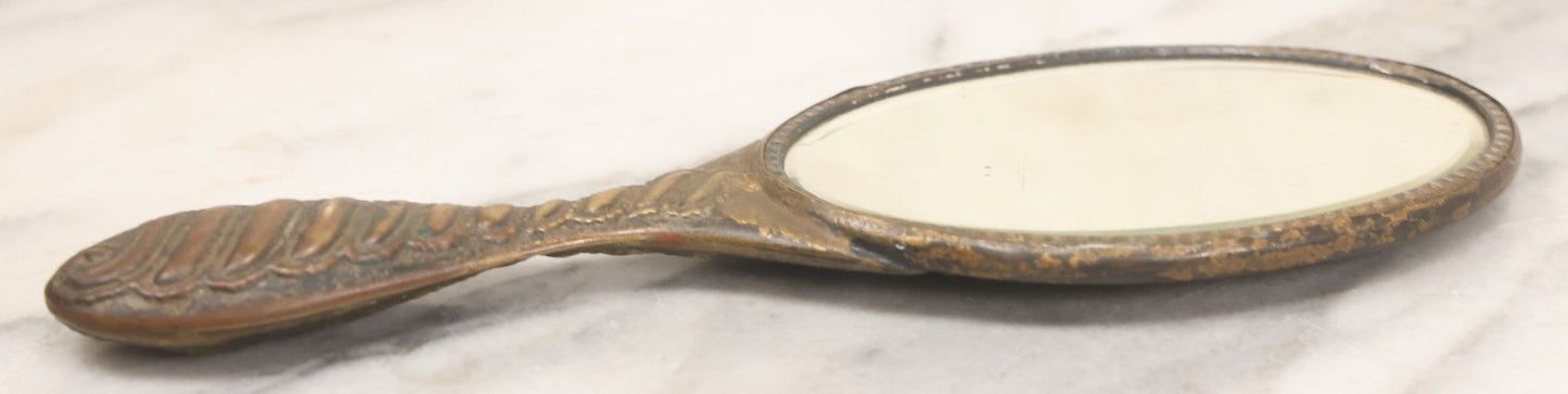 Lot 063 - Antique Pressed Brass Repousse Hand Mirror