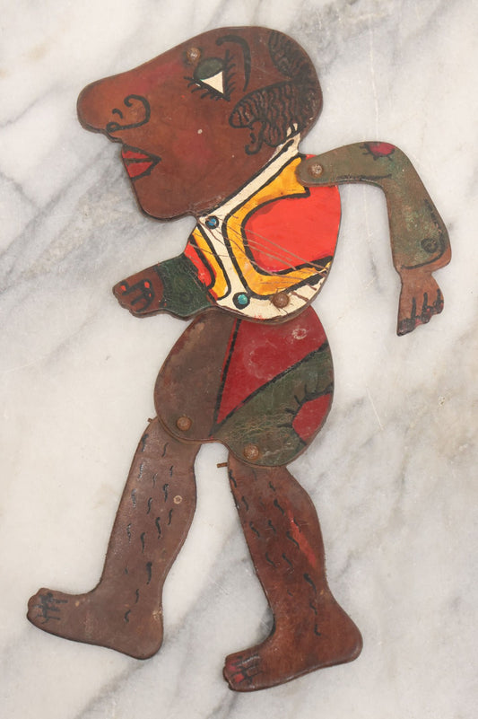 Lot 073 - Antique Hand Cut, Hand Painted Leather Jointed Puppet With Hair Legs