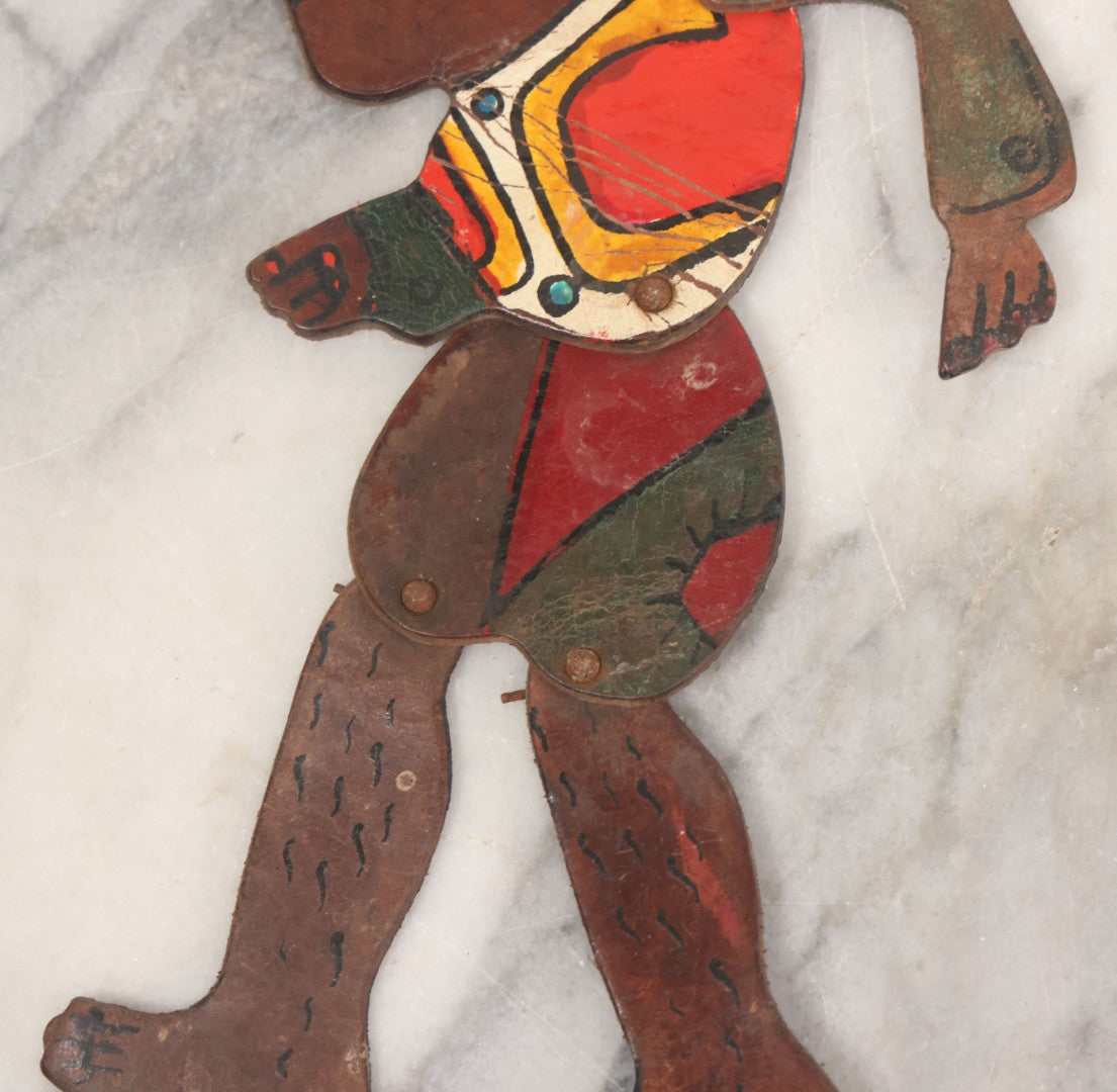 Lot 073 - Antique Hand Cut, Hand Painted Leather Jointed Puppet With Hair Legs