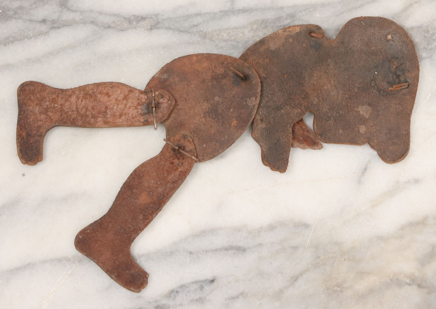 Lot 073 - Antique Hand Cut, Hand Painted Leather Jointed Puppet With Hair Legs