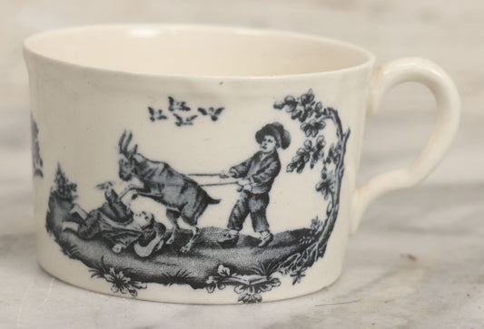 Lot 101 - Antique Transferware Children's Teacup With Scene Of Boys And Goat, Personages Line, Wedgwood, Etruria, England