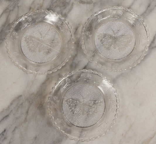 Lot 111 - Grouping Of Three Antique Pressed Glass Butterfly Cup Plate Coasters