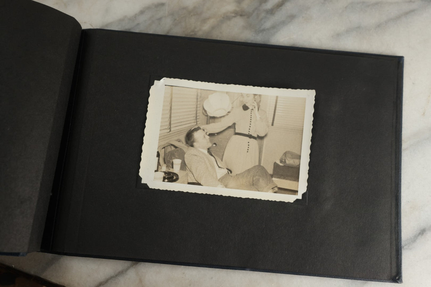 Lot 120 - Vintage Snapshot Photo Album, Containing Approximately 35 Photographs With Captions Of A Sultry, Sexy, Debaucherous Party Or Gathering, Including Ladies Posing Suggestively, Circa 1930