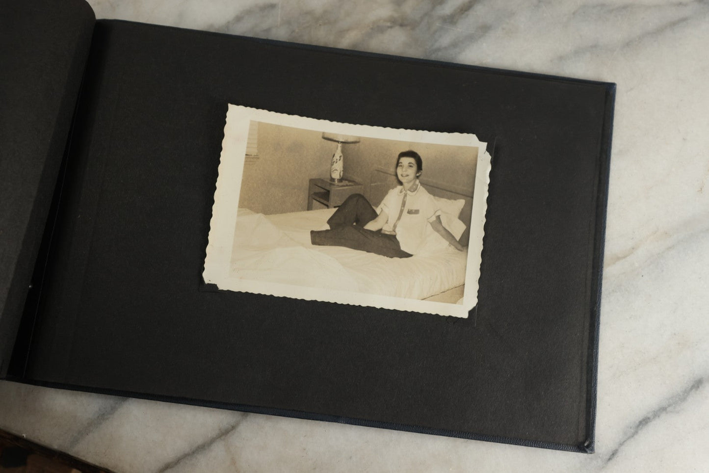 Lot 120 - Vintage Snapshot Photo Album, Containing Approximately 35 Photographs With Captions Of A Sultry, Sexy, Debaucherous Party Or Gathering, Including Ladies Posing Suggestively, Circa 1930