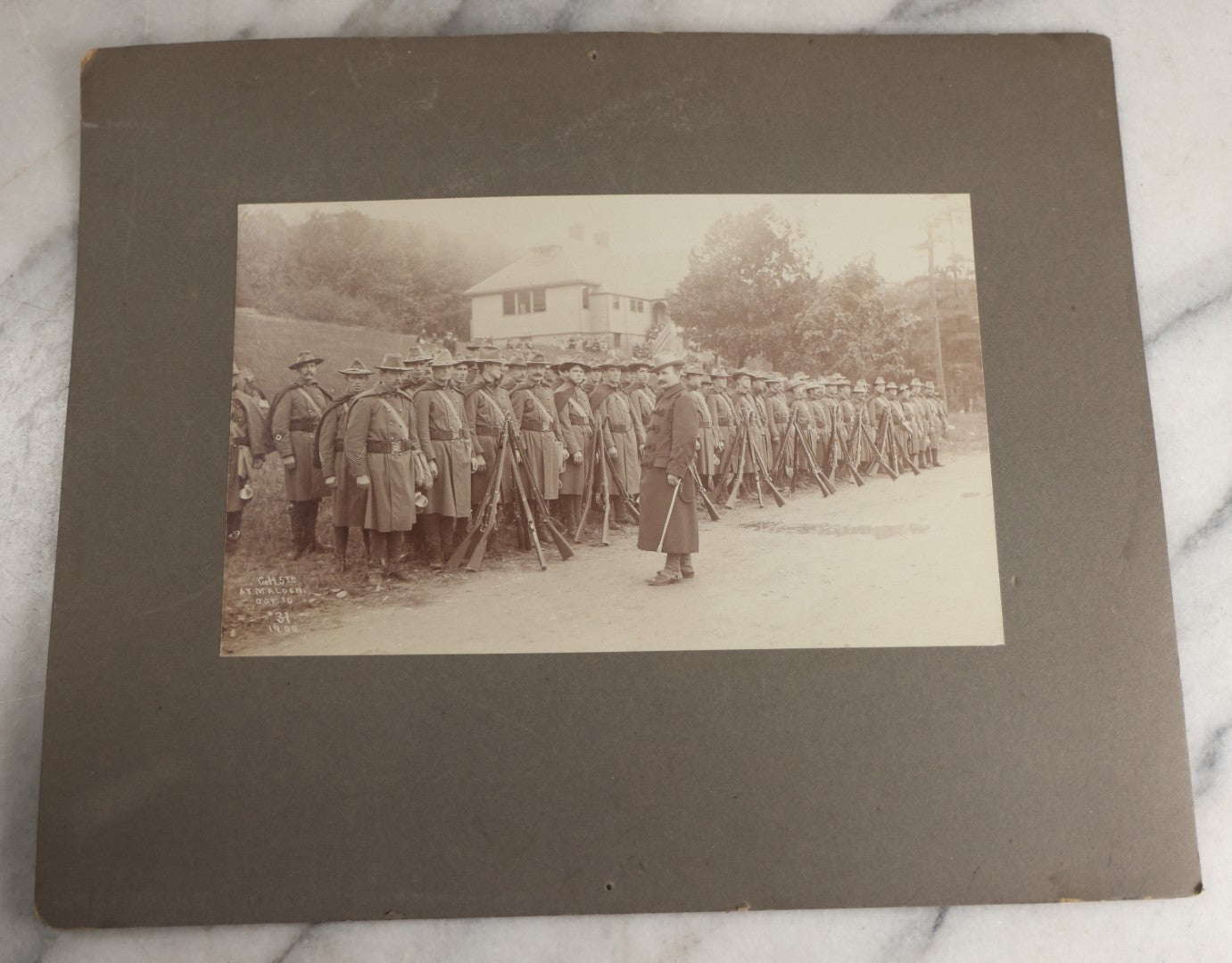 Lot 129 - Pair Of Antique Boarded Photographs Of Military Soldiers In Formation With Officer, Rifles In Frame, Circa 1890