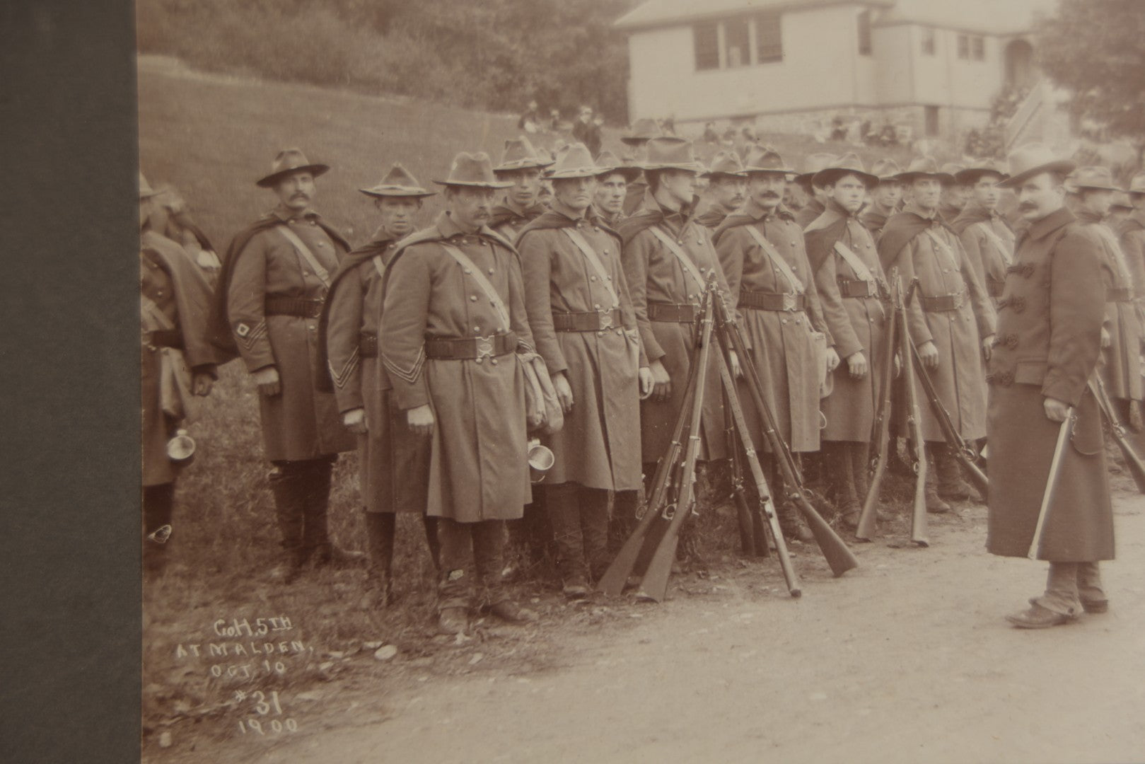 Lot 129 - Pair Of Antique Boarded Photographs Of Military Soldiers In Formation With Officer, Rifles In Frame, Circa 1890