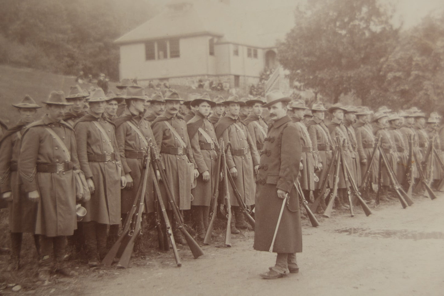 Lot 129 - Pair Of Antique Boarded Photographs Of Military Soldiers In Formation With Officer, Rifles In Frame, Circa 1890