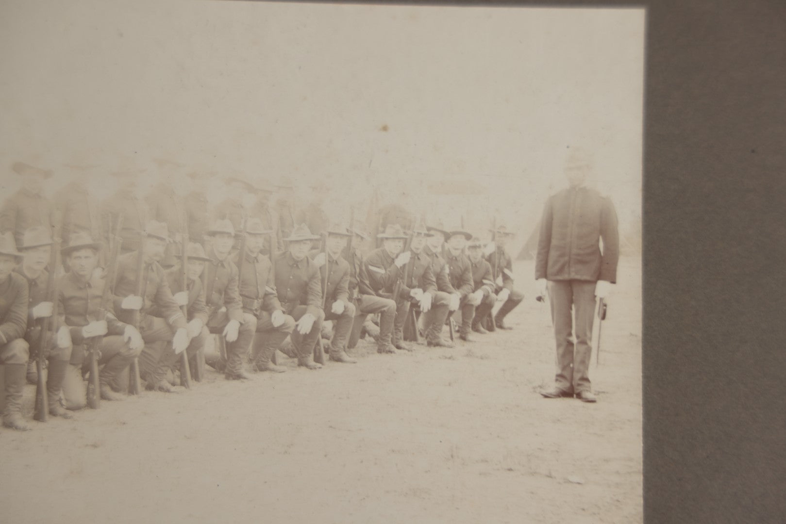 Lot 129 - Pair Of Antique Boarded Photographs Of Military Soldiers In Formation With Officer, Rifles In Frame, Circa 1890