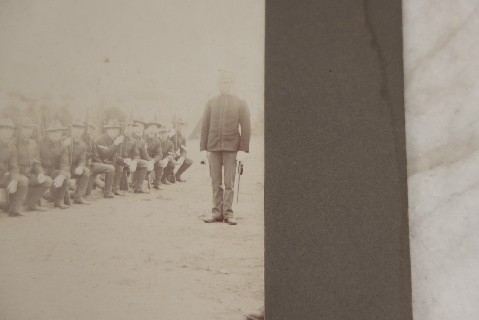 Lot 129 - Pair Of Antique Boarded Photographs Of Military Soldiers In Formation With Officer, Rifles In Frame, Circa 1890