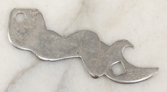 Lot 205 - Vintage Novelty Risque Pin Up Metal Advertising Bottle Opener, Advertising The Gibson Bar, Omaha, Nebraska
