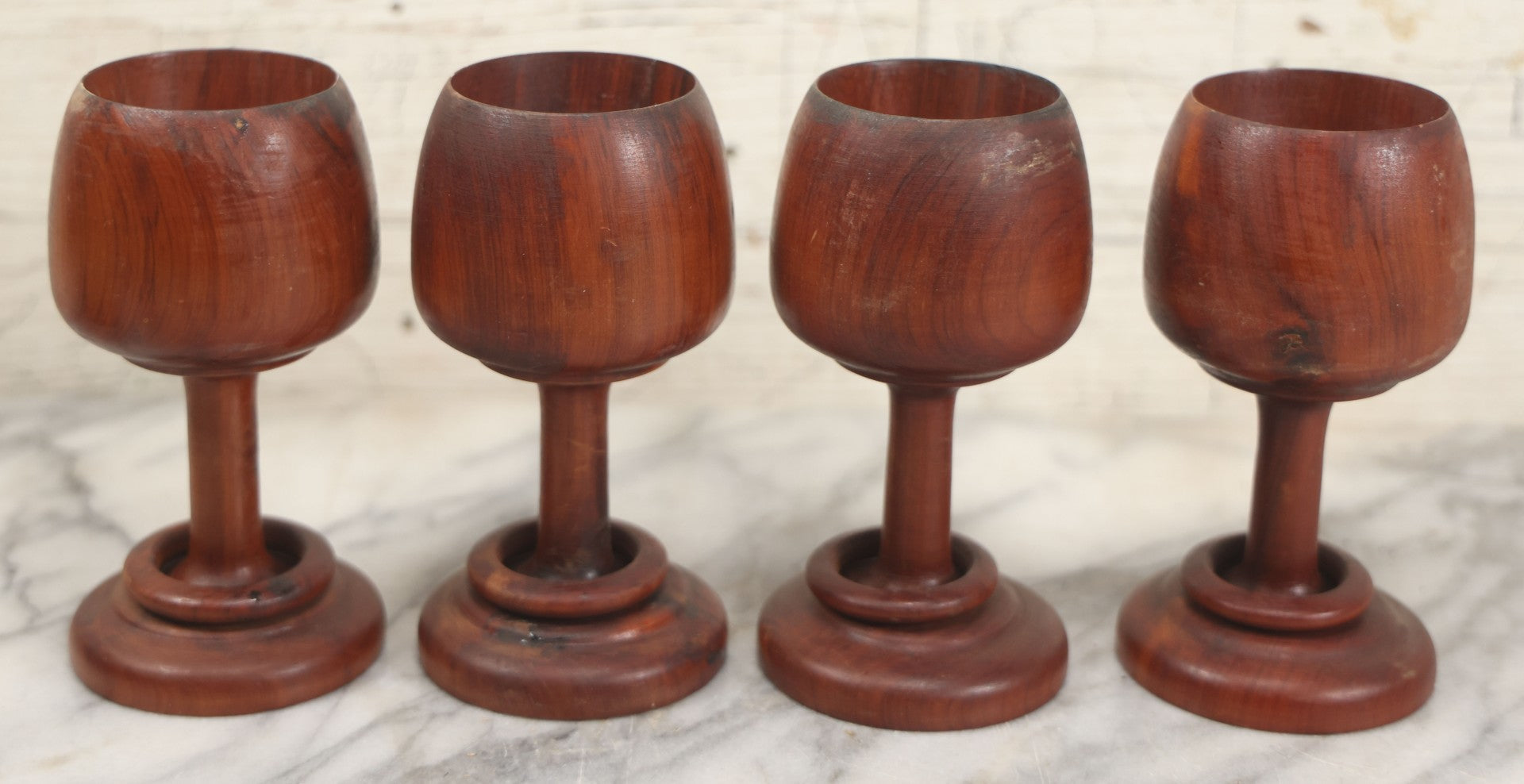 Lot 217 - Set Of Four Folk Art Whimsy Carved Goblet Cups With Captive Ring Around Stem