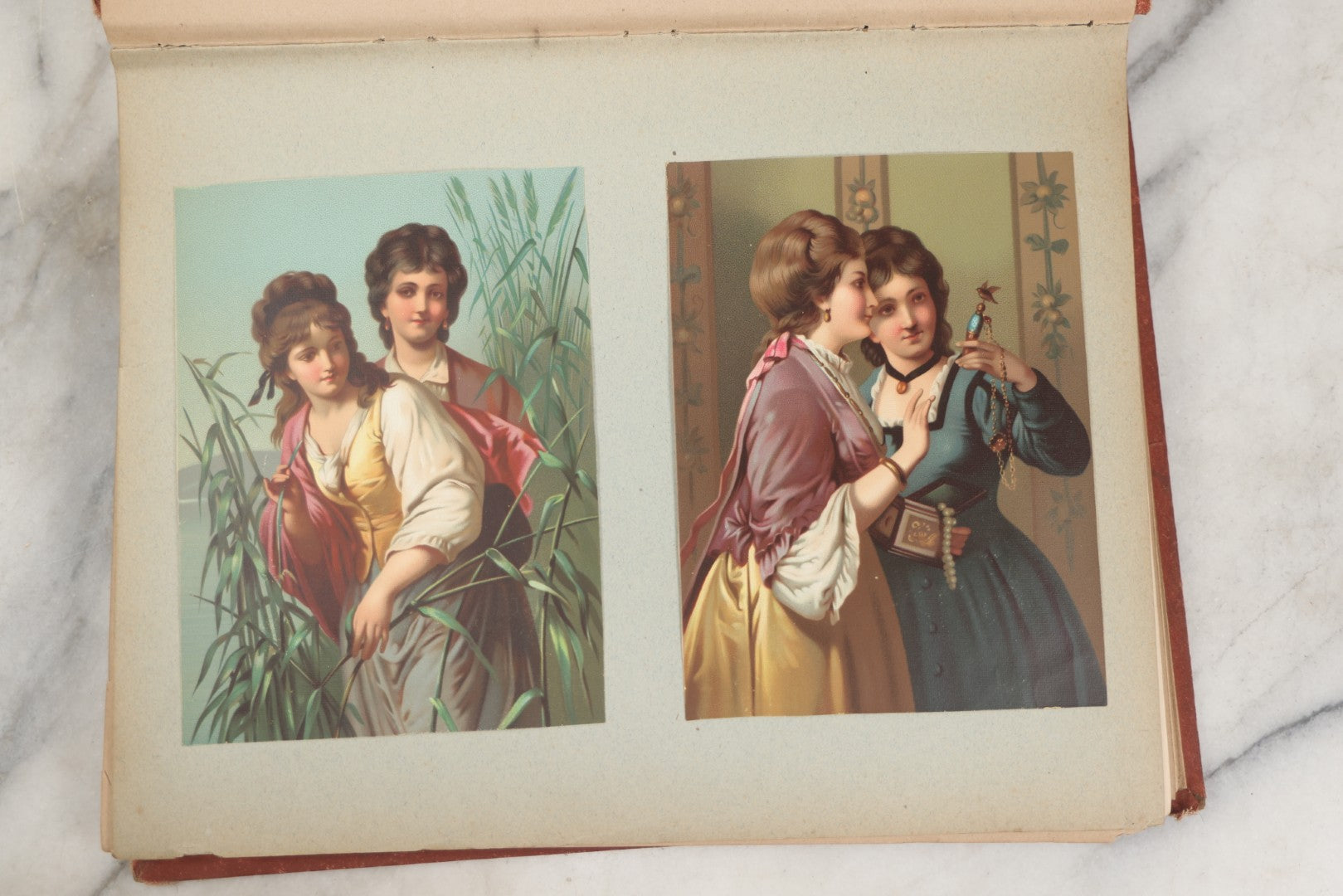 Lot 238 - Antique Victorian Scrapbook Containing Approximately Pieces, Mostly Bold Chromolithographs Of Beautiful Women, Nicely Organized