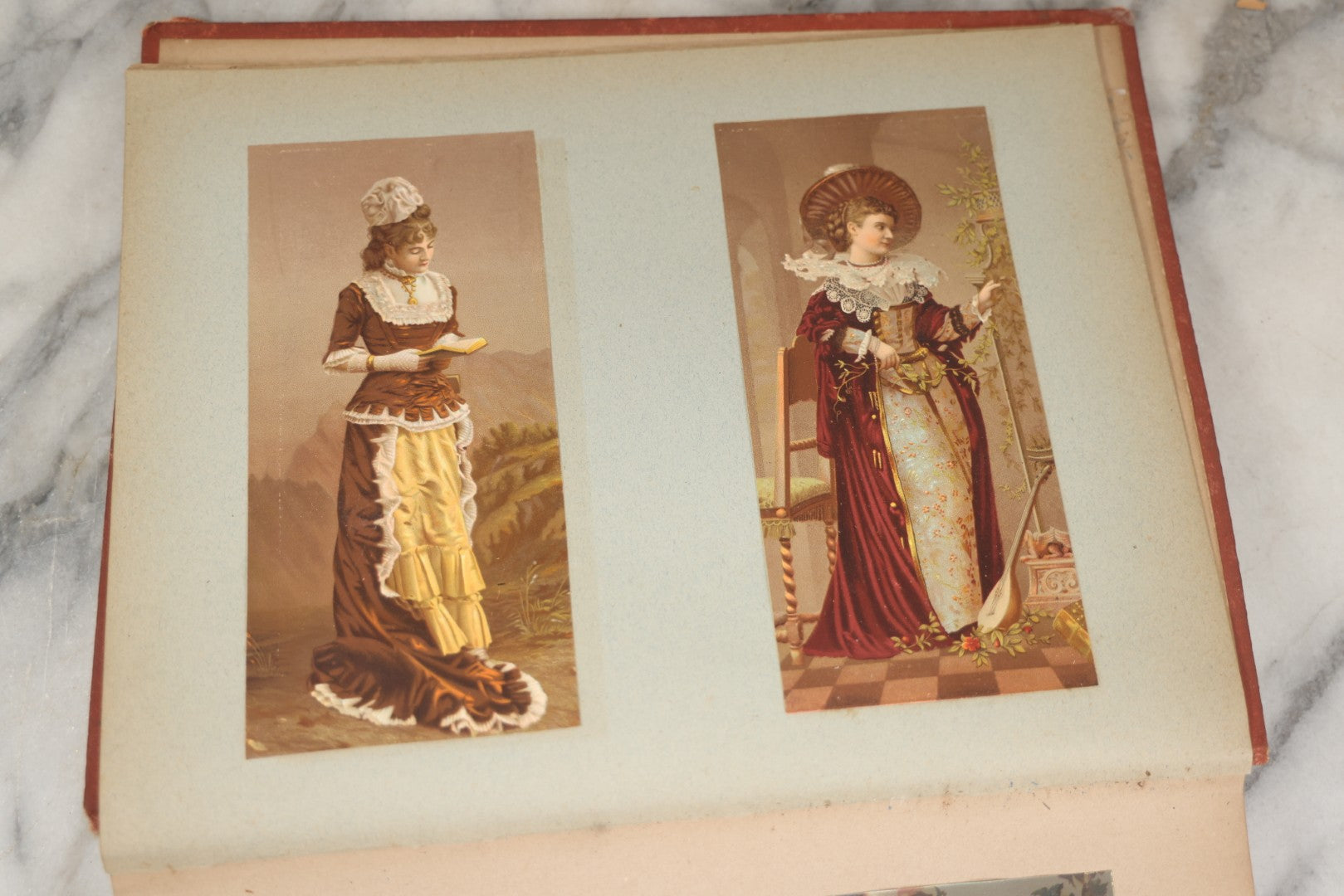 Lot 238 - Antique Victorian Scrapbook Containing Approximately Pieces, Mostly Bold Chromolithographs Of Beautiful Women, Nicely Organized
