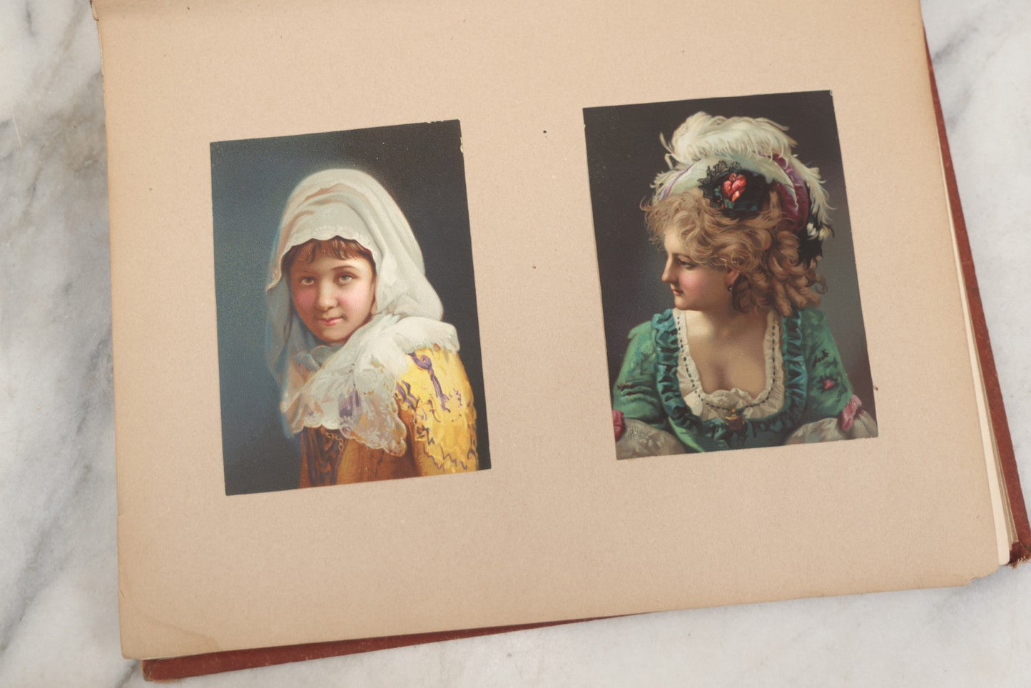 Lot 238 - Antique Victorian Scrapbook Containing Approximately Pieces, Mostly Bold Chromolithographs Of Beautiful Women, Nicely Organized