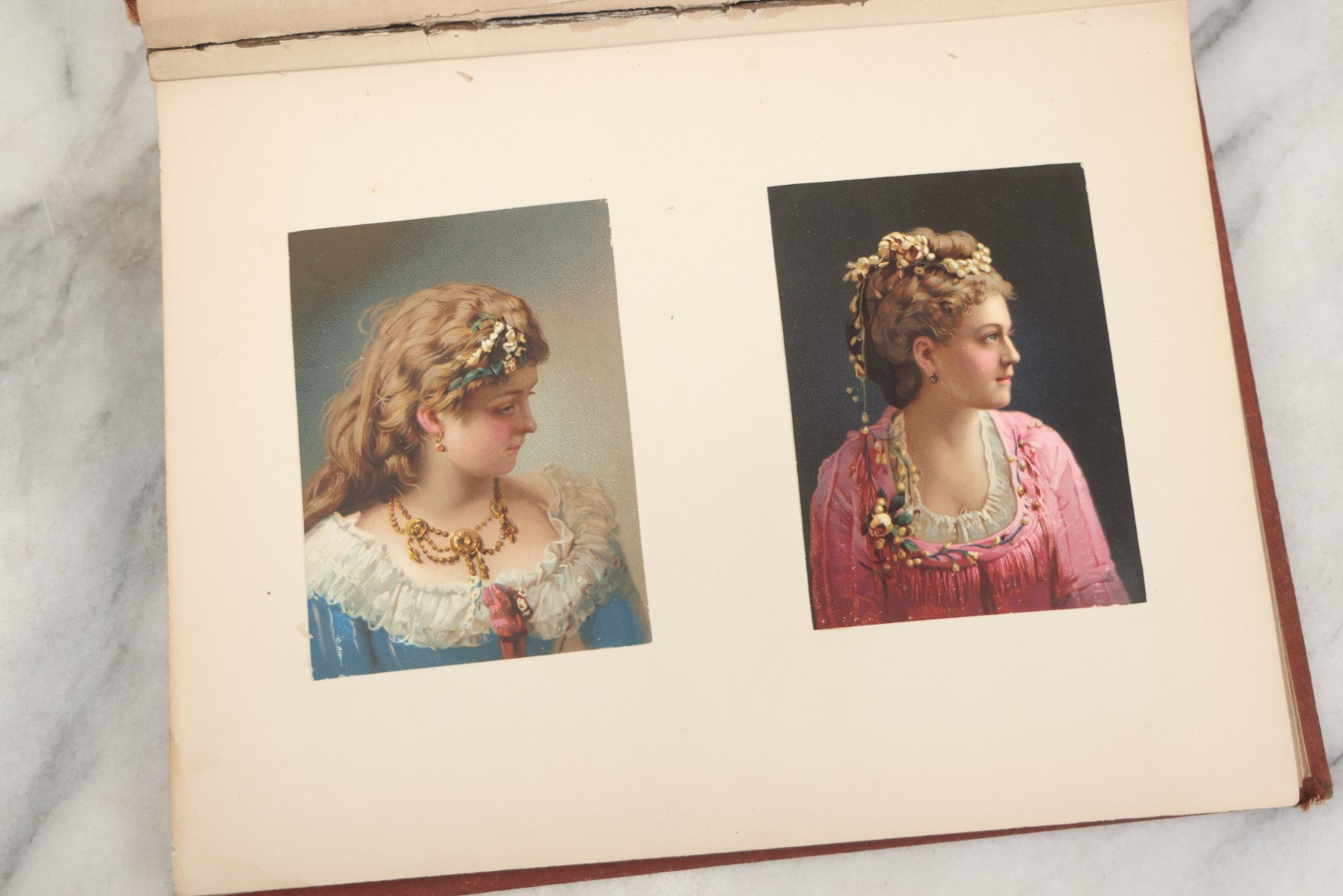 Lot 238 - Antique Victorian Scrapbook Containing Approximately Pieces, Mostly Bold Chromolithographs Of Beautiful Women, Nicely Organized