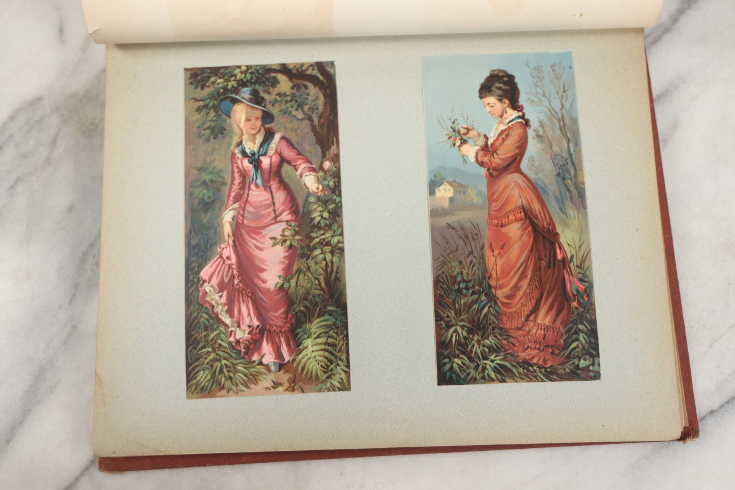 Lot 238 - Antique Victorian Scrapbook Containing Approximately Pieces, Mostly Bold Chromolithographs Of Beautiful Women, Nicely Organized