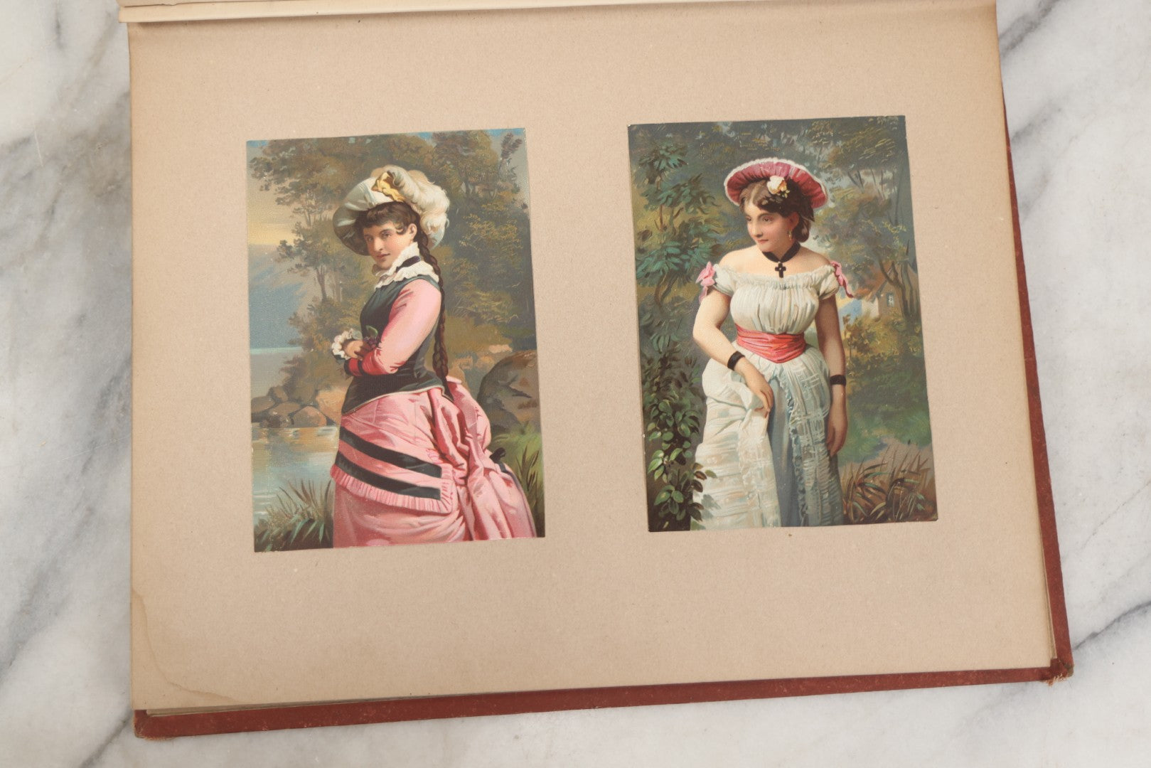 Lot 238 - Antique Victorian Scrapbook Containing Approximately Pieces, Mostly Bold Chromolithographs Of Beautiful Women, Nicely Organized