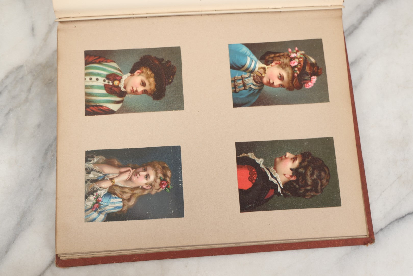 Lot 238 - Antique Victorian Scrapbook Containing Approximately Pieces, Mostly Bold Chromolithographs Of Beautiful Women, Nicely Organized