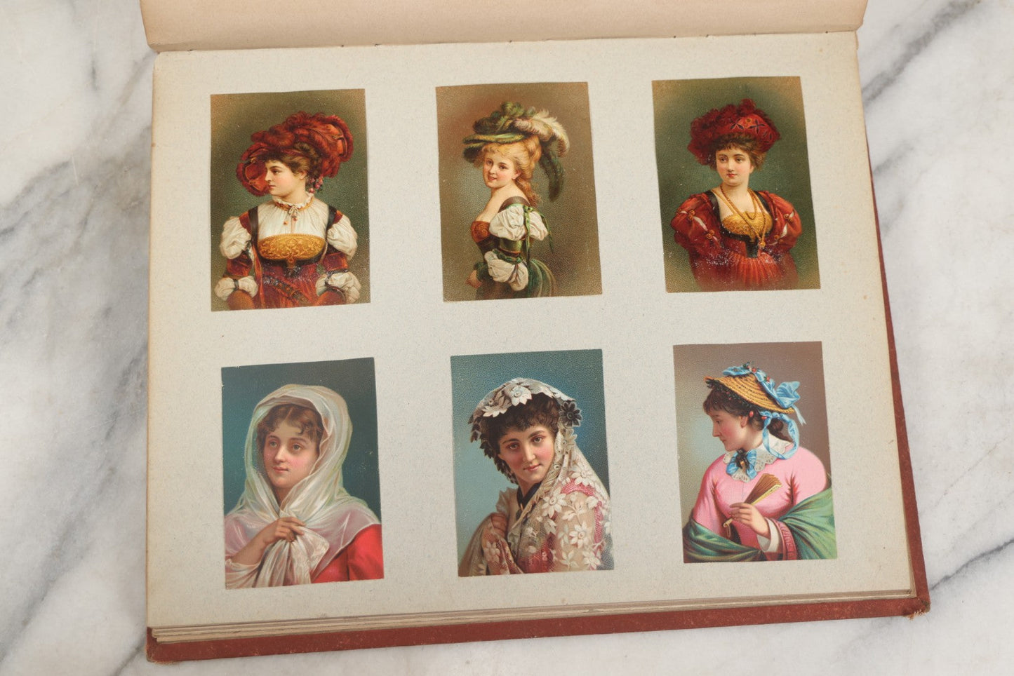 Lot 238 - Antique Victorian Scrapbook Containing Approximately Pieces, Mostly Bold Chromolithographs Of Beautiful Women, Nicely Organized