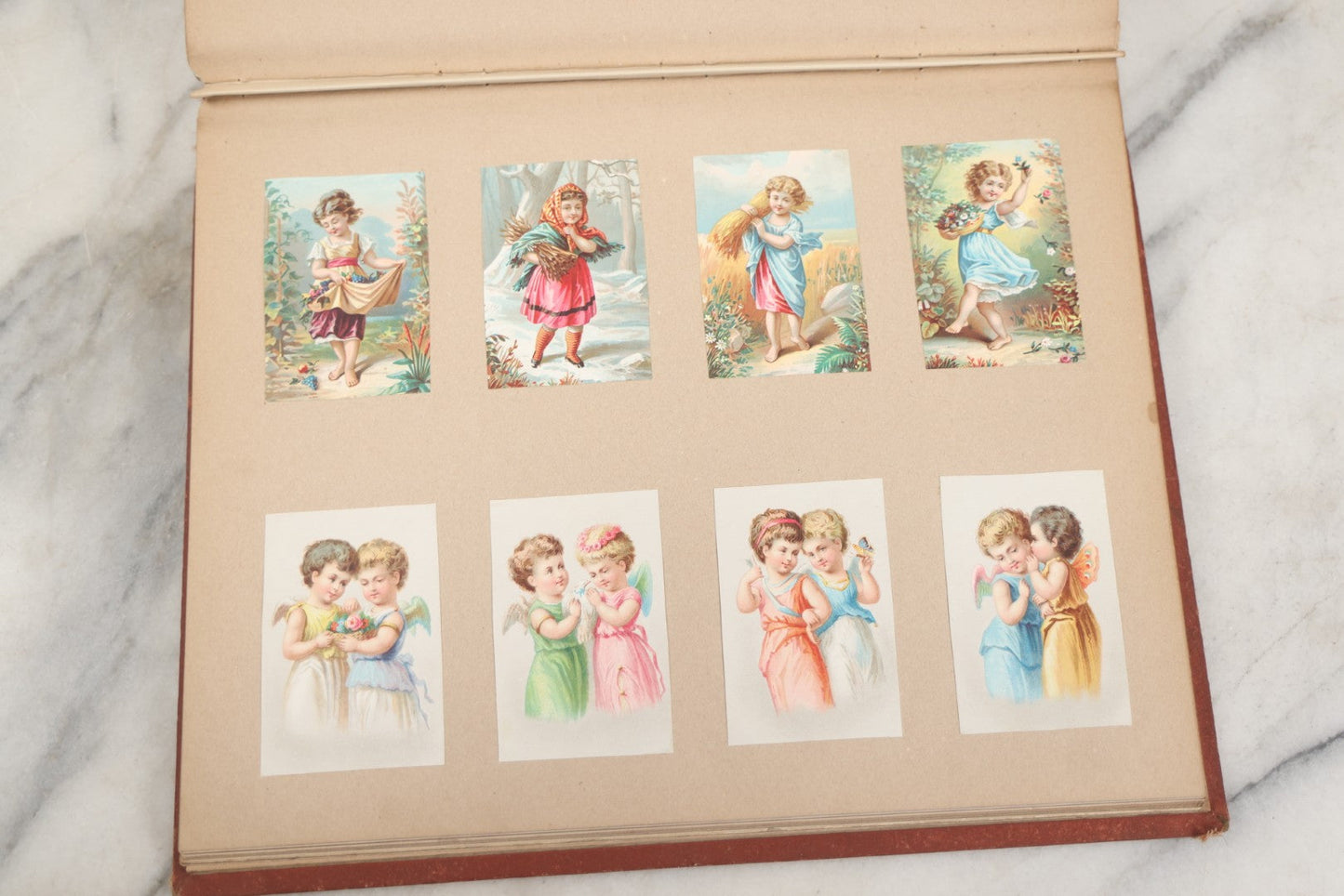 Lot 238 - Antique Victorian Scrapbook Containing Approximately Pieces, Mostly Bold Chromolithographs Of Beautiful Women, Nicely Organized