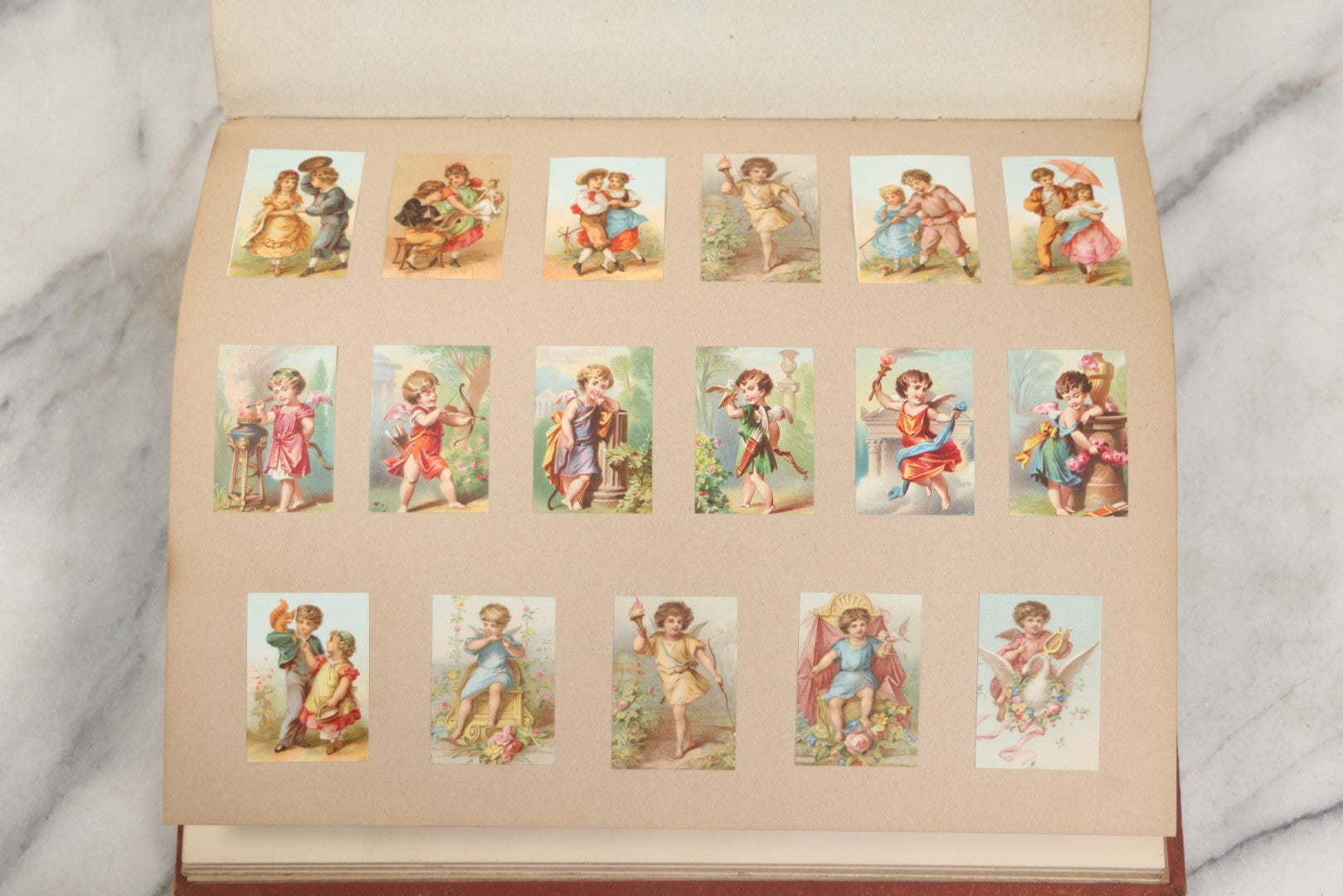 Lot 238 - Antique Victorian Scrapbook Containing Approximately Pieces, Mostly Bold Chromolithographs Of Beautiful Women, Nicely Organized