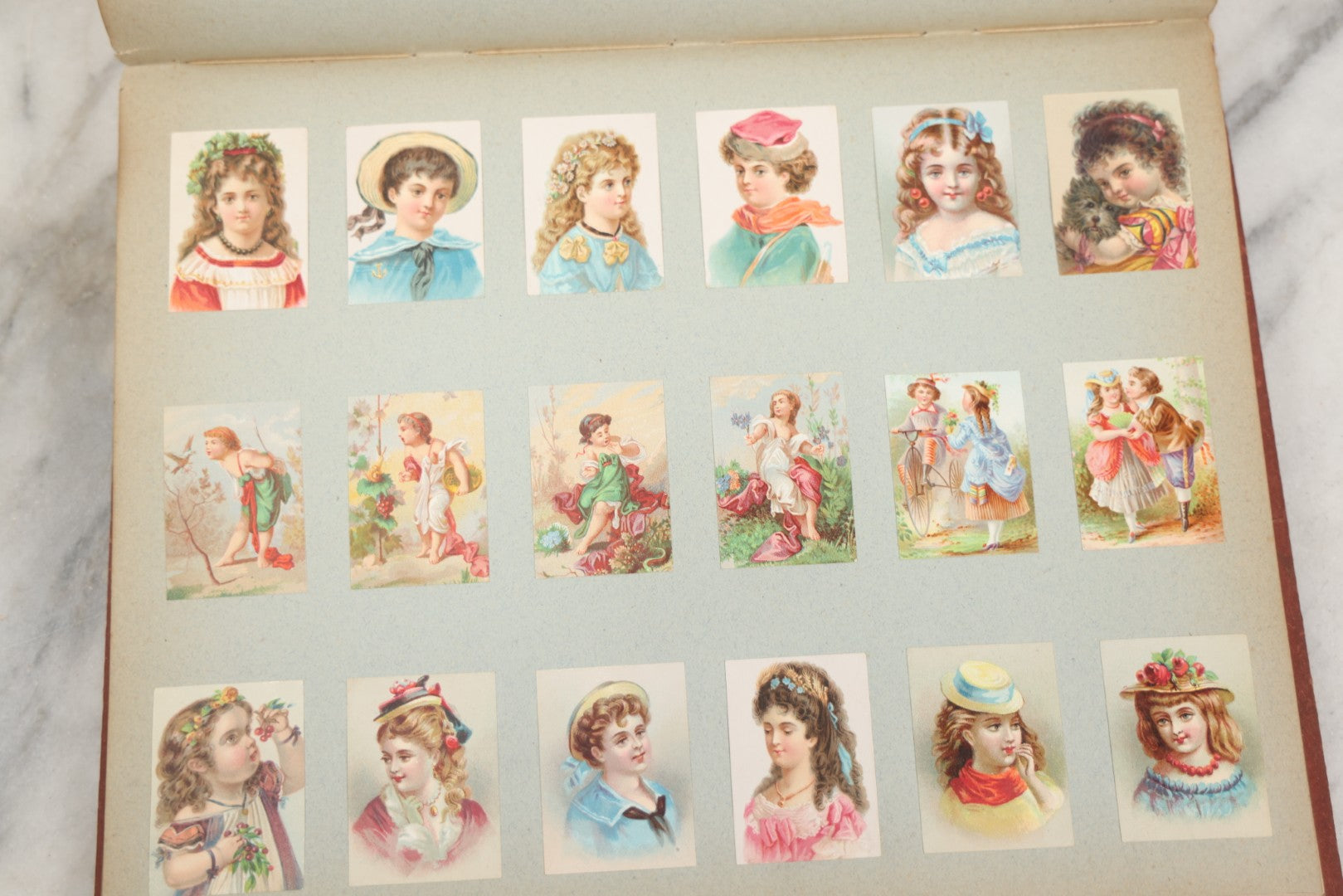 Lot 238 - Antique Victorian Scrapbook Containing Approximately Pieces, Mostly Bold Chromolithographs Of Beautiful Women, Nicely Organized