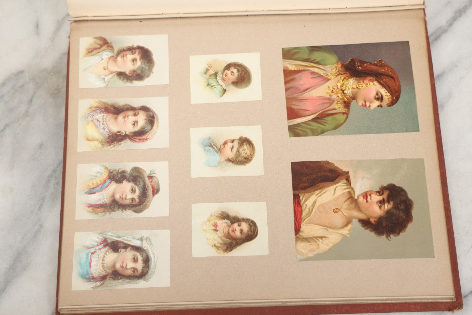 Lot 238 - Antique Victorian Scrapbook Containing Approximately Pieces, Mostly Bold Chromolithographs Of Beautiful Women, Nicely Organized