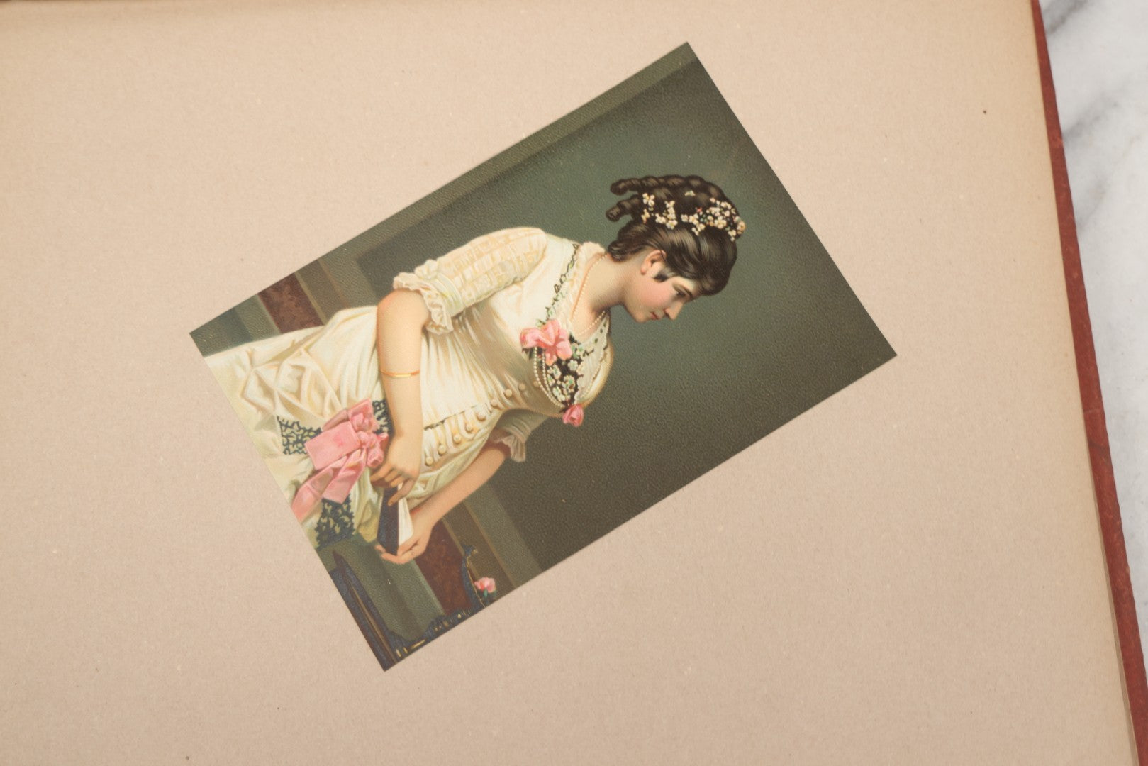 Lot 238 - Antique Victorian Scrapbook Containing Approximately Pieces, Mostly Bold Chromolithographs Of Beautiful Women, Nicely Organized