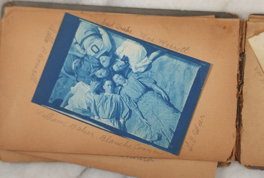 Lot 241 - Antique Snapshot And Cyanotype Photo Album Contained In A Victorian Autograph Book, Containing Photos Of The Students Of West Newbury High School, Massachusetts, Including Creative Group Shots, Beach Scenes, Playful Friends, And More