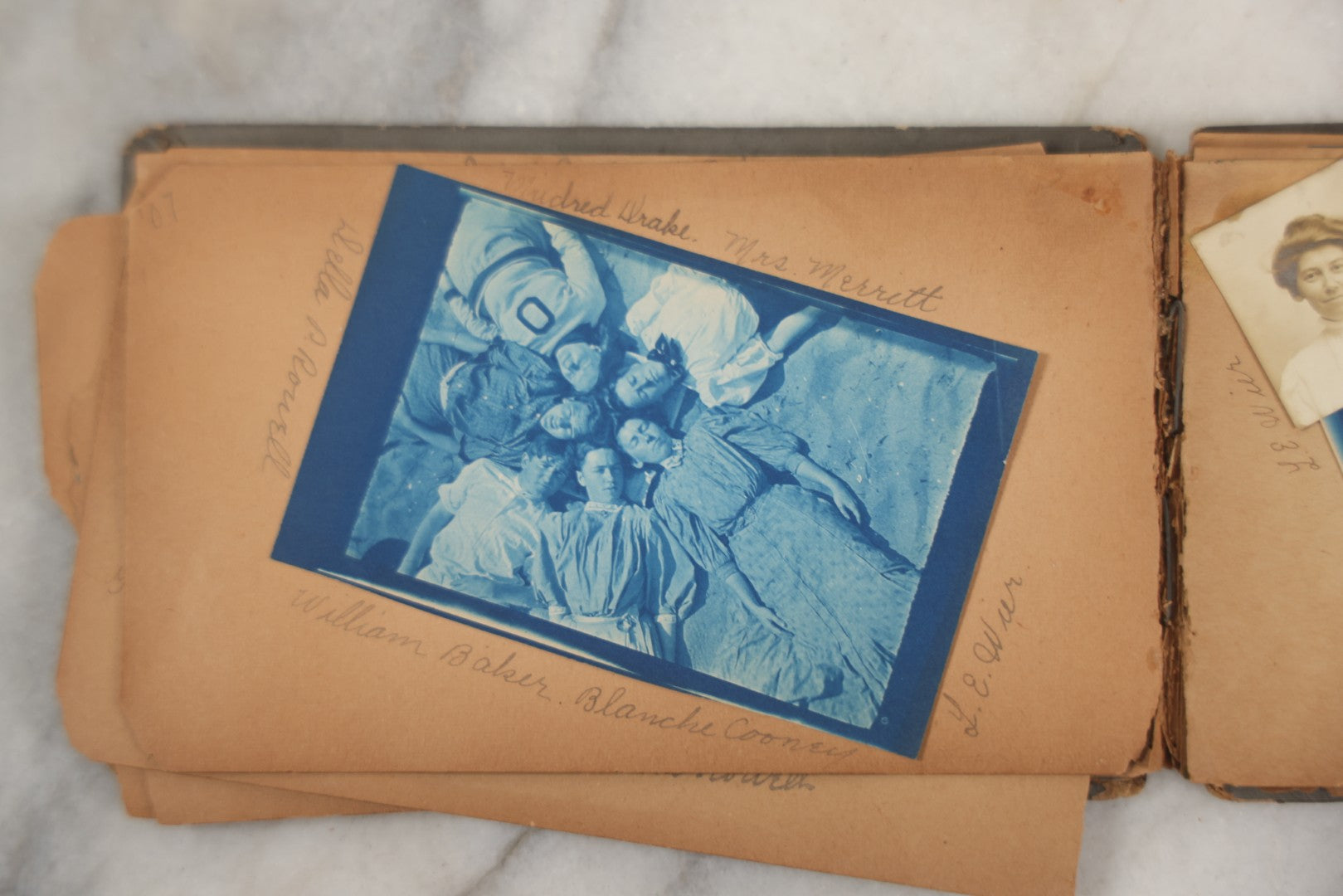 Lot 241 - Antique Snapshot And Cyanotype Photo Album Contained In A Victorian Autograph Book, Containing Photos Of The Students Of West Newbury High School, Massachusetts, Including Creative Group Shots, Beach Scenes, Playful Friends, And More