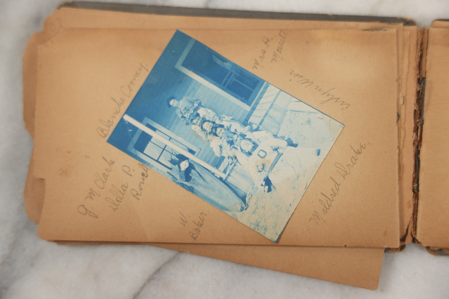 Lot 241 - Antique Snapshot And Cyanotype Photo Album Contained In A Victorian Autograph Book, Containing Photos Of The Students Of West Newbury High School, Massachusetts, Including Creative Group Shots, Beach Scenes, Playful Friends, And More