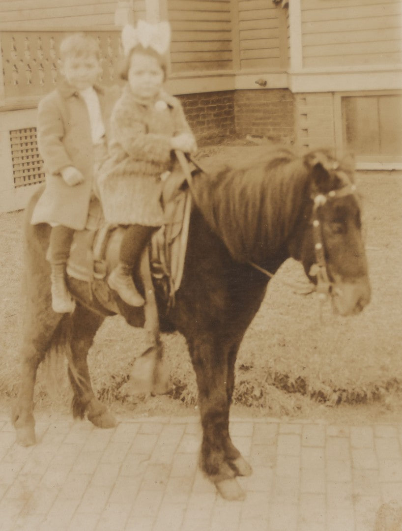Lot 249 - Single Antique Boarded Photograph Of Two Toddlers Riding A Mini Horse, Circa 1895, Identified On Verso