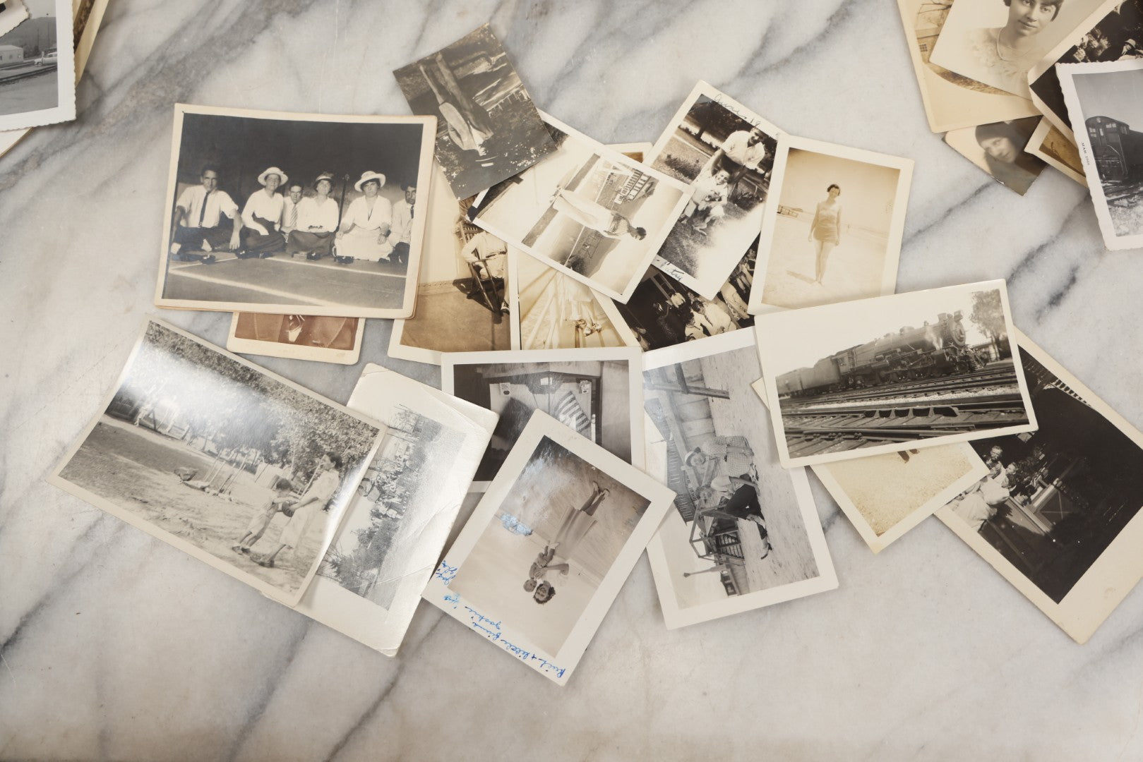 Lot 250 - Grouping Of Approximately 50 Vintage And Antique Snapshot Photographs, Mostly Of Daily Life, Cars, Military, Pets, Beach, And More