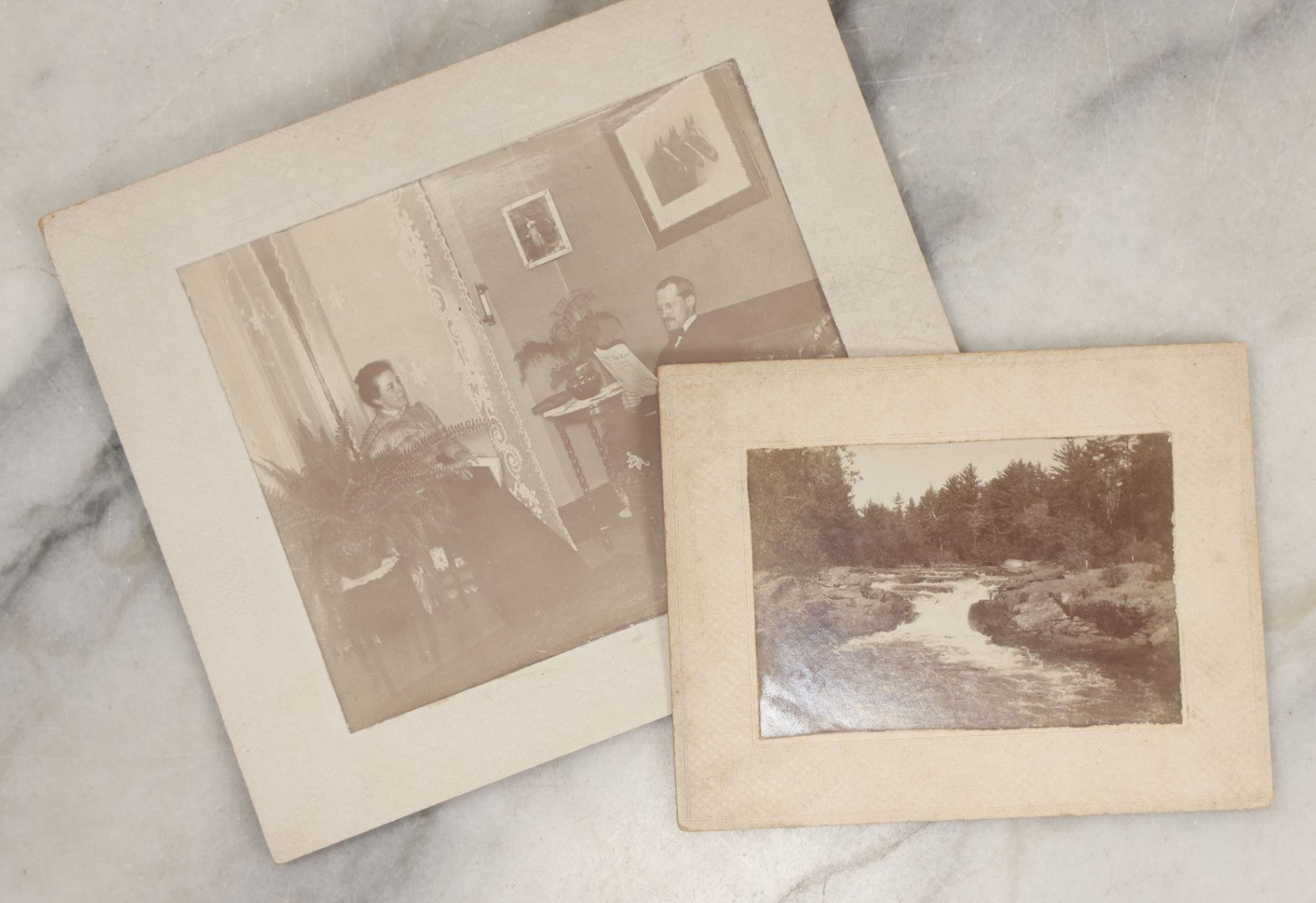 Lot 261 - Pair Of Antique Boarded Photographs, Including Man And Women Interior, Photo Of River, Flume