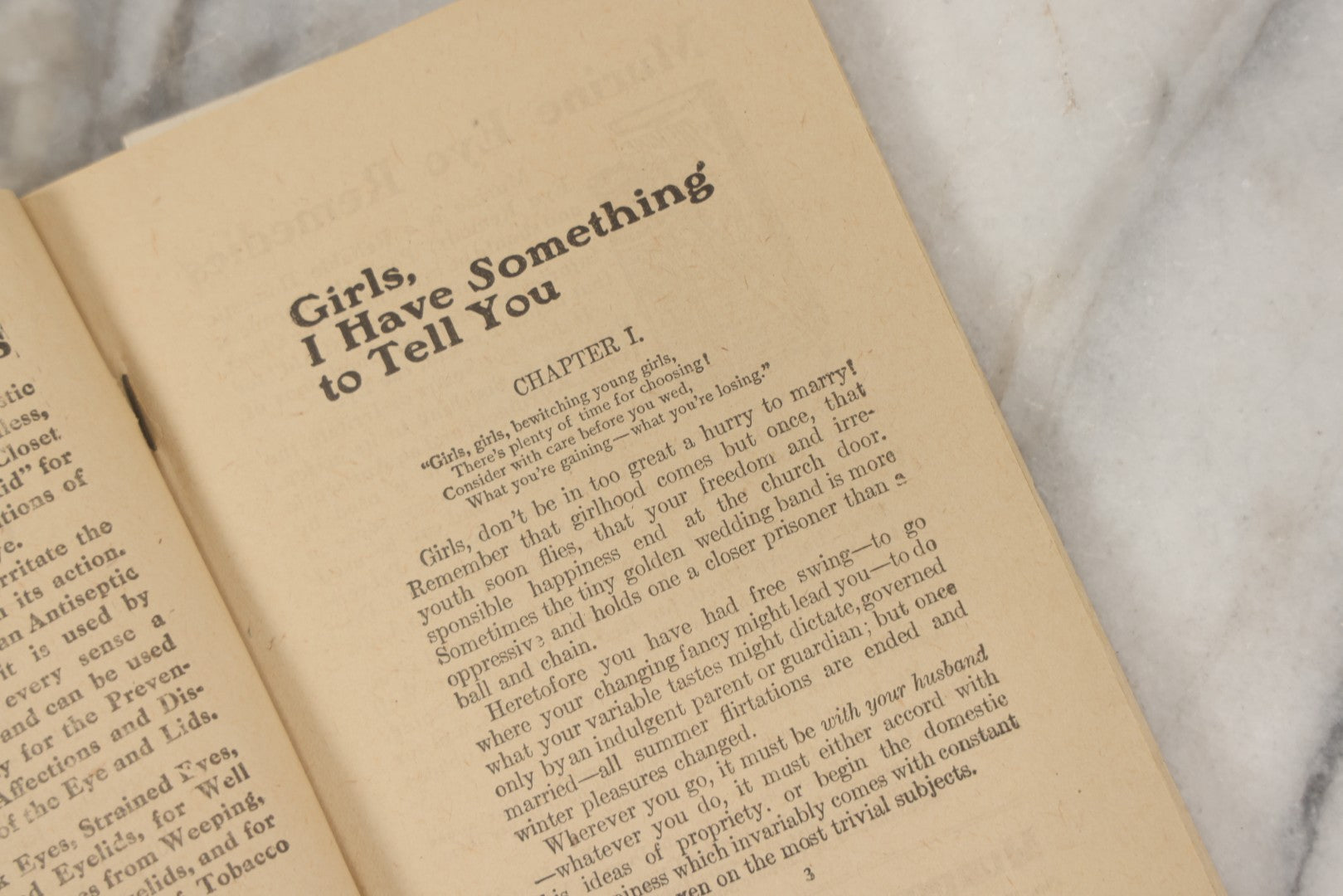 Lot 266 - "Love, Courtship, Marriage By A Woman Of The World" Antique Illustrated Paperback With Cupid Illustration On Cover And Bandaged Cat Mascot, J.S. Ogilvie, Publisher, New York, 1902, "A Hundred Ways Of Kissing Girls" Advertisement On Back Cover