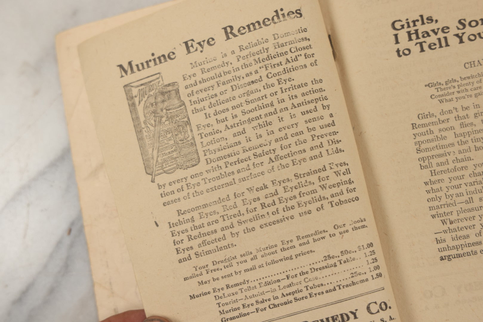 Lot 266 - "Love, Courtship, Marriage By A Woman Of The World" Antique Illustrated Paperback With Cupid Illustration On Cover And Bandaged Cat Mascot, J.S. Ogilvie, Publisher, New York, 1902, "A Hundred Ways Of Kissing Girls" Advertisement On Back Cover